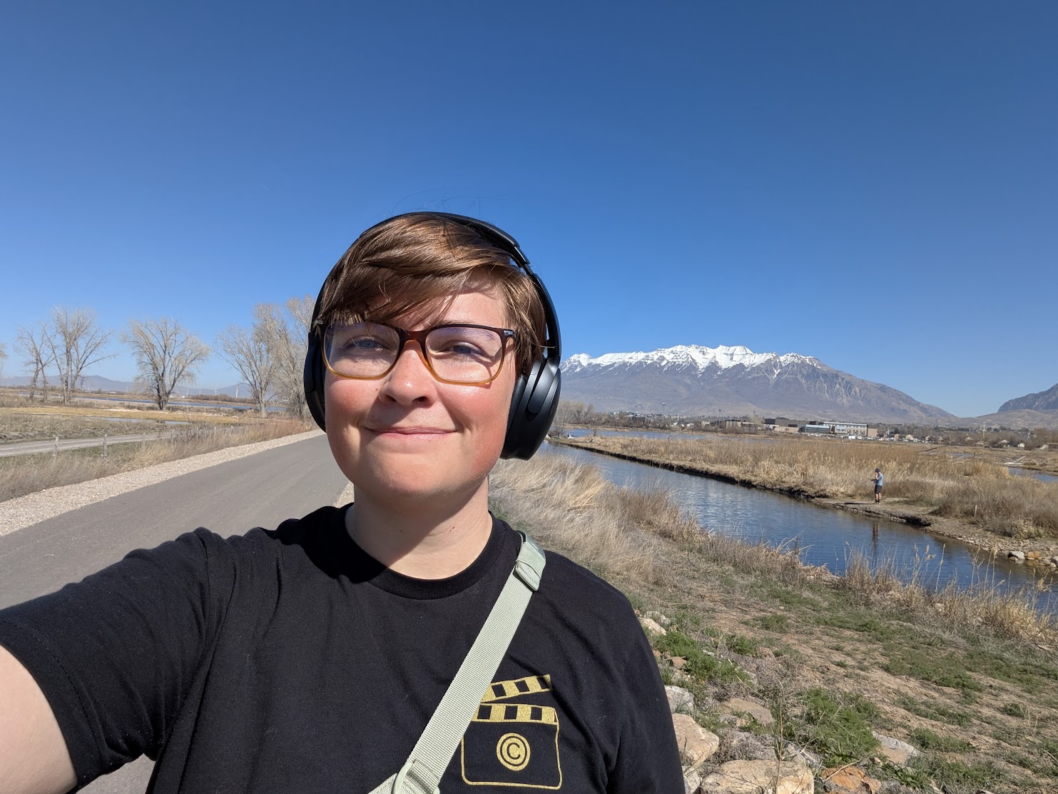 Sarah birding with headphones on